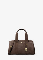 Suede handbag, soft suede barrel-style bag with minimalist detailing.